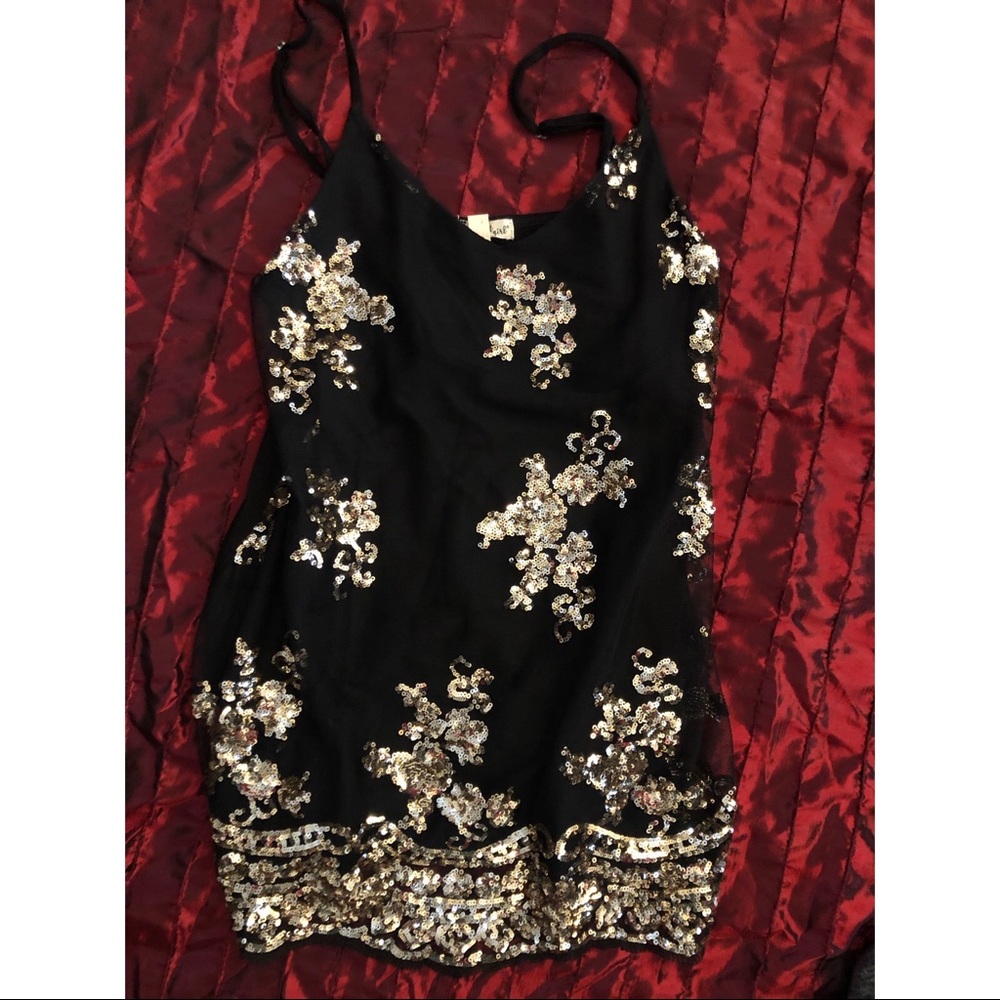 Gorgeous black and gold top